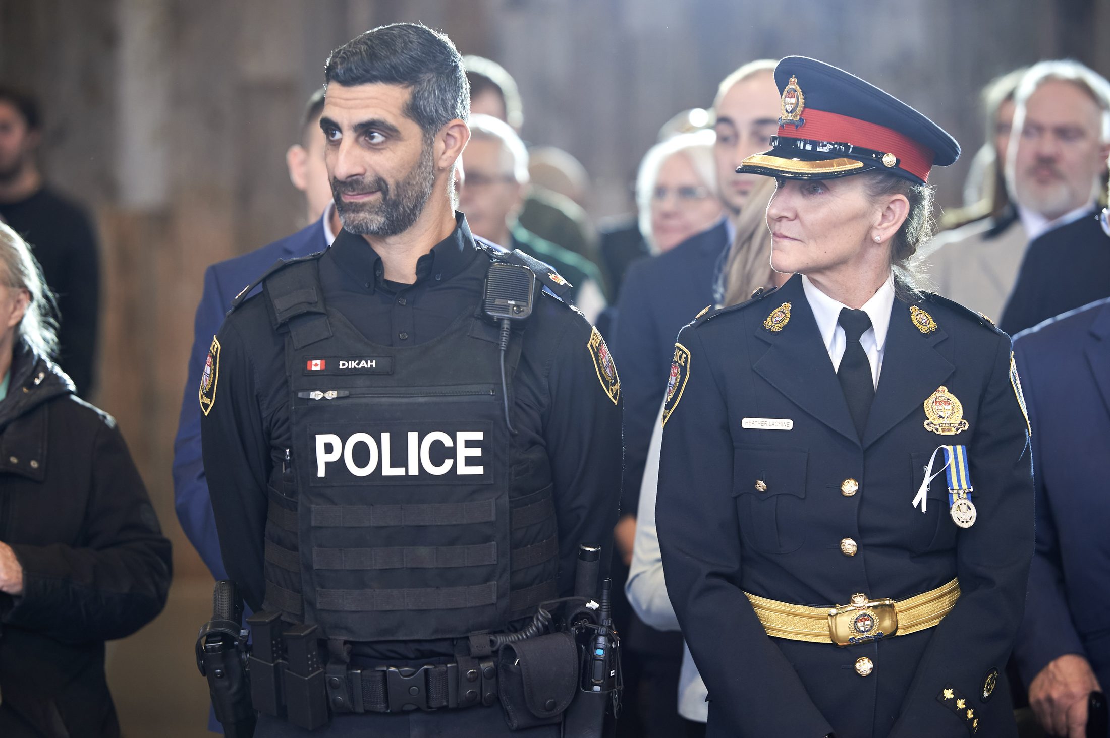 Ottawa Police officers standing together at a ceremonial event.