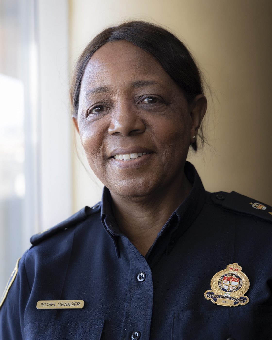 Ottawa Police Service officer in dress uniform.